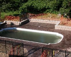 interlock wall around stamped pool deck