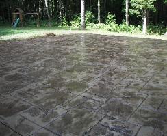 large ashlar slate stamped concrete patio