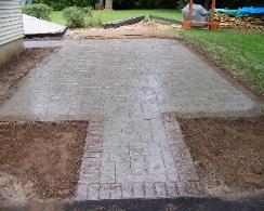 Aslar slate with brick border stamped concrete