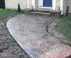  random stone stamped concrete sidewalk.