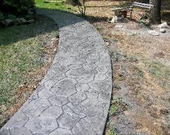 random stone stamped concrete walkway