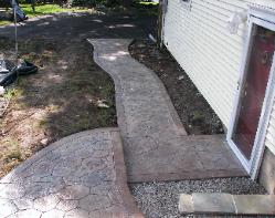 Random stone walk with six inch border.